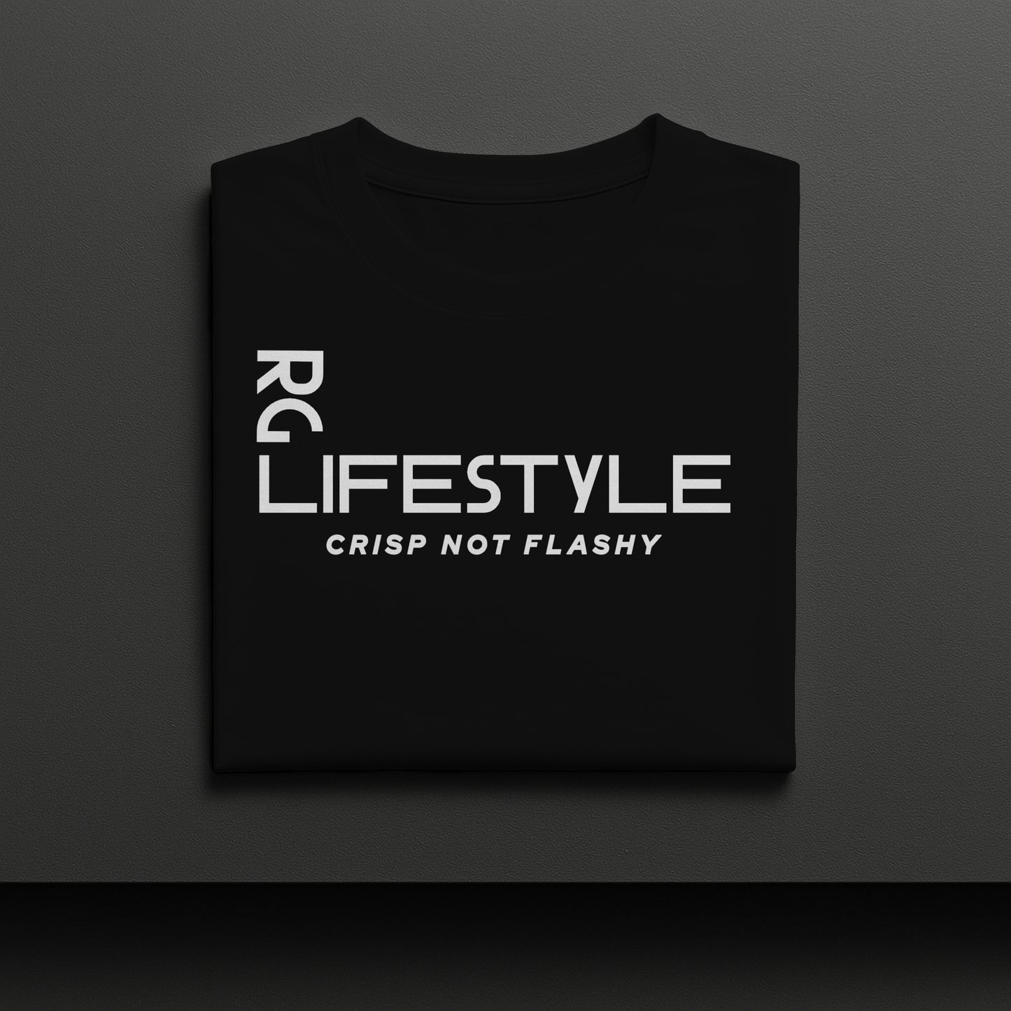 Black t-shirt with white text on a dark gray background