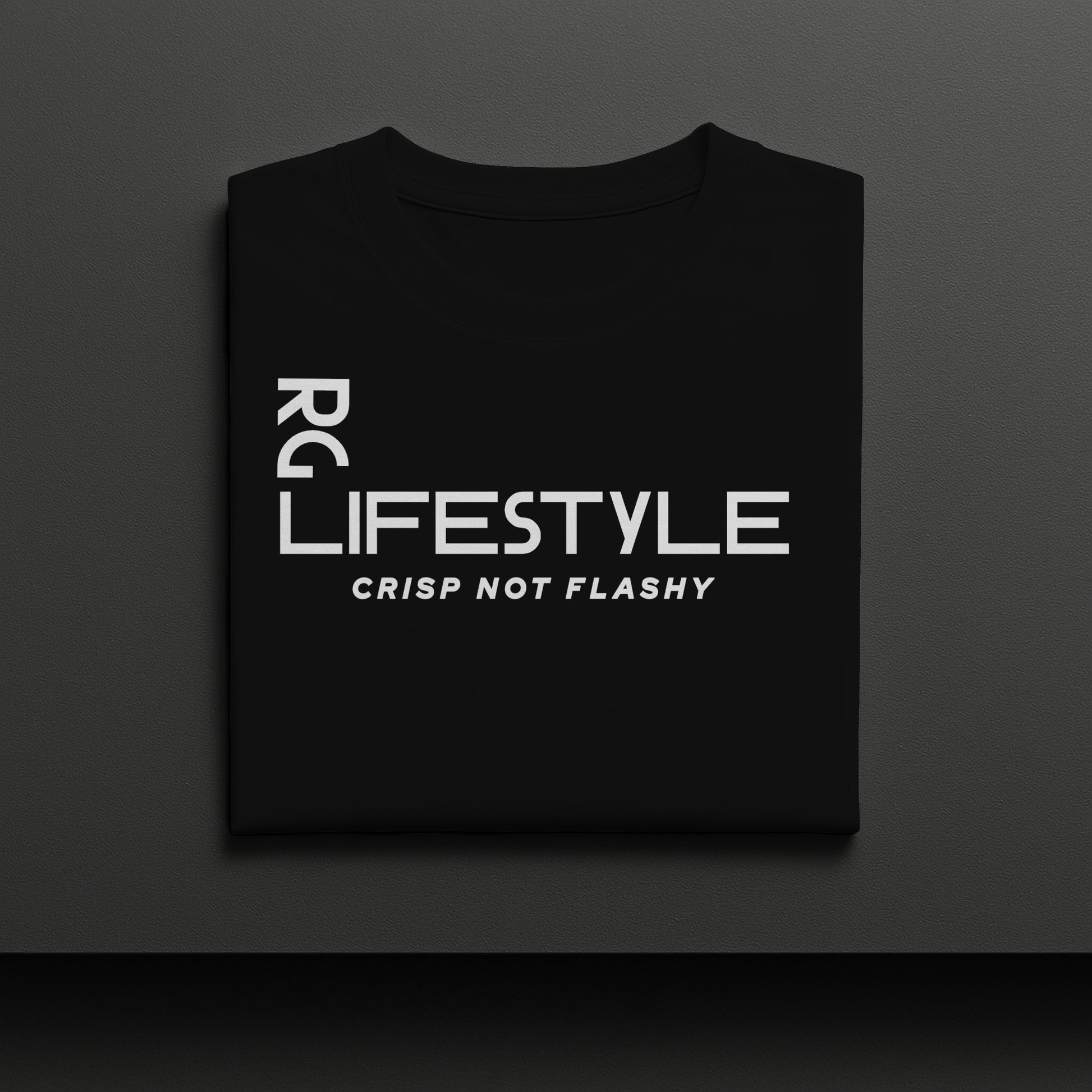 Black t-shirt with white text on a dark gray background